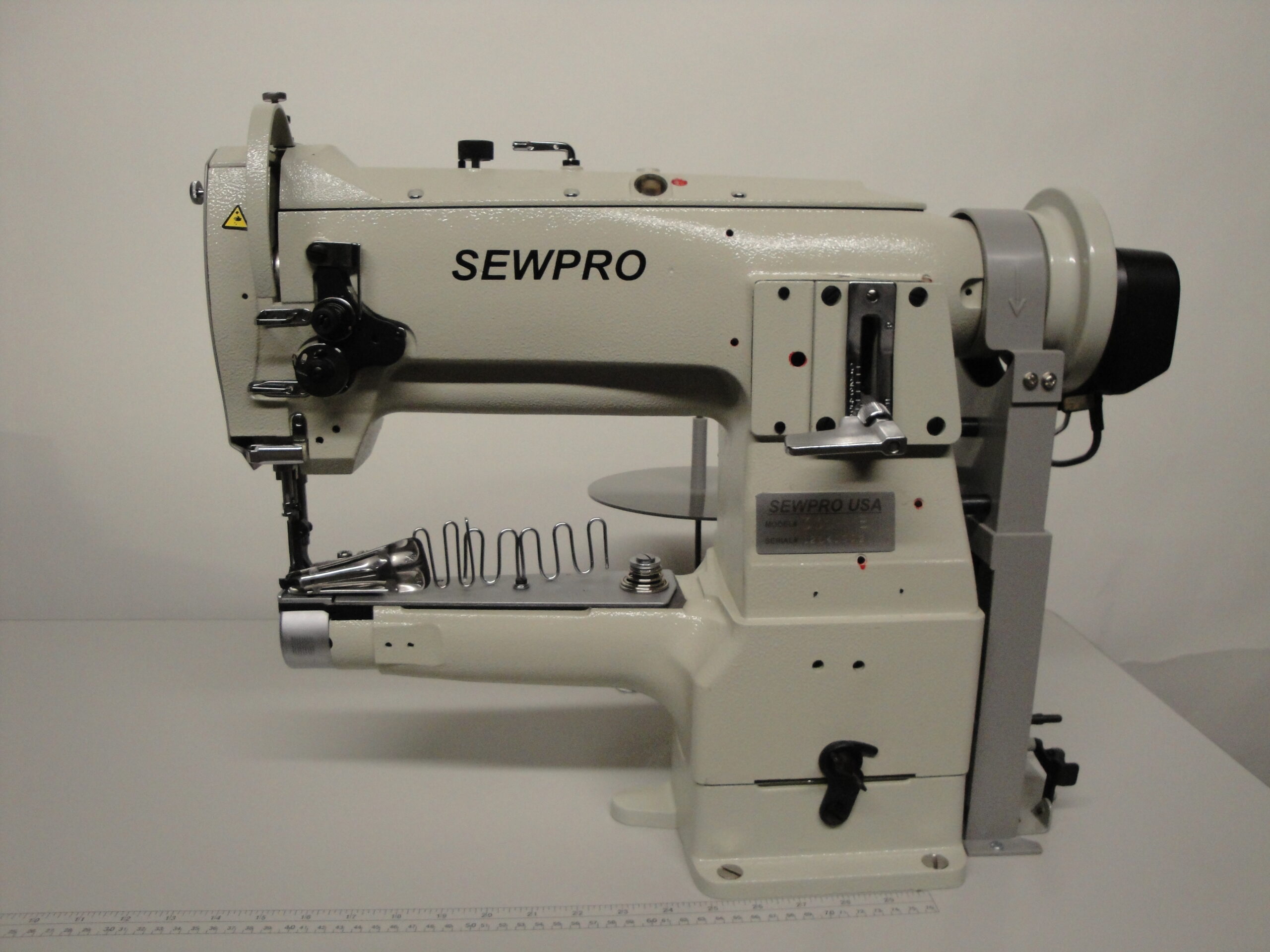 Streamlined Binding: The SEWPRO 335VB for Efficient Tape Application | SEWPRO SEWPRO 335VB Shop heavy-duty industrial sewing machines for upholstery, leather, canvas, and vinyl. SewPro USA offers durable, professional equipment and expert support