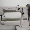 This heavy-duty, single-needle machine features a cylinder bed, compound needle feed, walking foot, and large shuttle hook for tackling thick materials and tubular items. Special harness feet allow for easy sewing near buckles and tight edges.